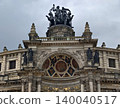 Impressive ceremonial entrance adorned with elaborate artistic features emphasizing history and culture 140040517