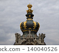 Spectacular baroque crown embellishing rooftop with exquisite sculptures and intricate decorative features 140040526