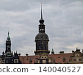 Historical Victorian inspired edifice displaying elaborate craftsmanship and copper decorative elements 140040527