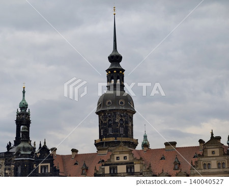 Historical Victorian inspired edifice displaying elaborate craftsmanship and copper decorative elements 140040527