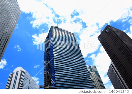 Landscape of the office town looking up at a skyscraper 140041243