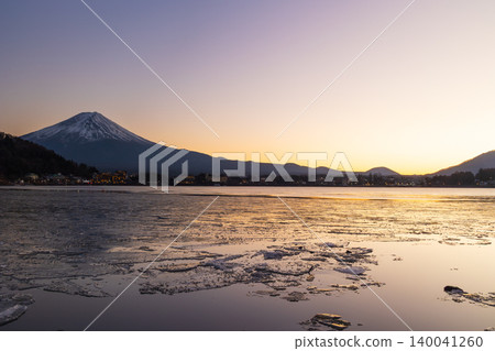 Winter in Fujikawaguchiko Town, Yamanashi Prefecture: Mount Fuji and Lake Kawaguchi at sunset. Winter in Fujikawaguchiko Town, Yamanashi Prefecture: Mount Fuji and Lake Kawaguchi at sunset. 140041260