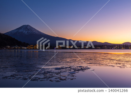 Winter in Fujikawaguchiko Town, Yamanashi Prefecture: Mount Fuji and Lake Kawaguchi at sunset. Winter in Fujikawaguchiko Town, Yamanashi Prefecture: Mount Fuji and Lake Kawaguchi at sunset. 140041266
