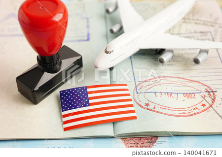 US America flag and passport with airplane for travel. US America flag and passport with airplane for travel. 140041671
