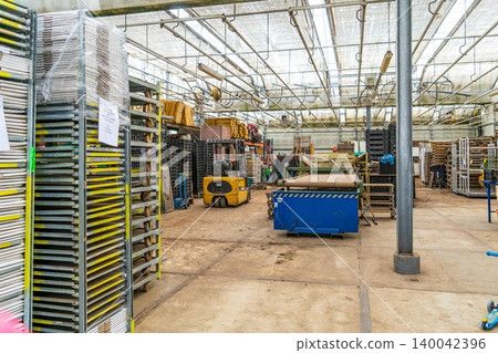 warehouse interior with shelves, pallets and boxes warehouse interior with shelves, pallets and boxes 140042396