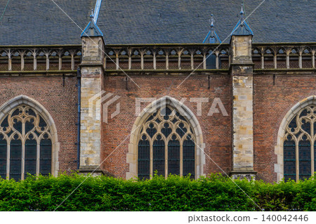 Window in medieval style with colored glasses. Window in medieval style with colored glasses. 140042446