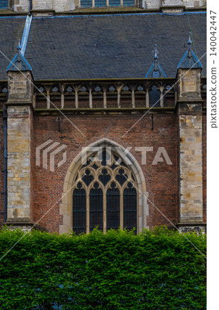 Window in medieval style with colored glasses. Window in medieval style with colored glasses. 140042447