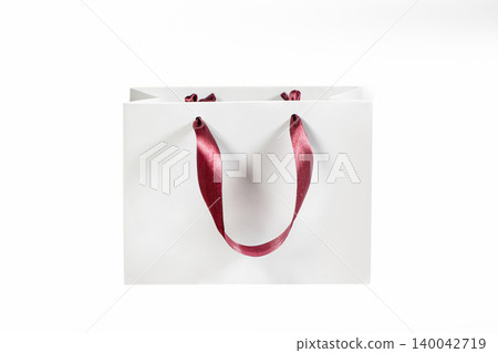 Recyclable craft paper bag for purchases, gifts and takeaway food mock up on white background. Environmentally friendly than single-use plastic bags Recyclable craft paper bag for purchases, gifts and takeaway food mock up on white background. Environmentally friendly than single-use plastic bags 140042719