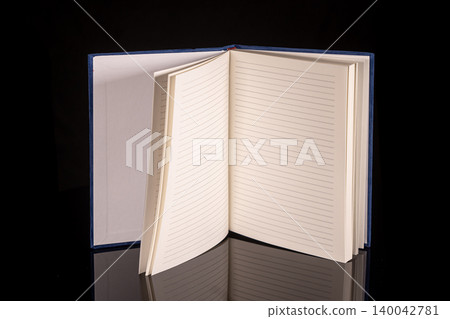 close up of a blank velour fluffy notebook on black background with clipping path close up of a blank velour fluffy notebook on black background with clipping path 140042781