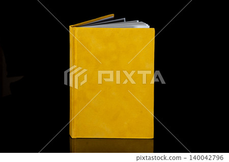 close up of a blank velour fluffy notebook on black background with clipping path close up of a blank velour fluffy notebook on black background with clipping path 140042796