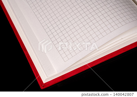 close up of a blank velour fluffy notebook with opened pages on black background with clipping path close up of a blank velour fluffy notebook with opened pages on black background with clipping path 140042807