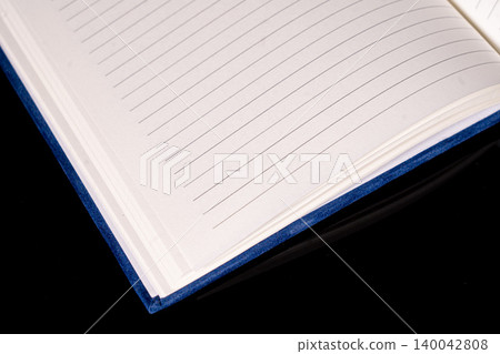 close up of a blank velour fluffy notebook with opened pages on black background with clipping path close up of a blank velour fluffy notebook with opened pages on black background with clipping path 140042808
