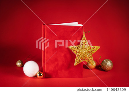close up of a red velour fluffy notebook on red christmas background with clipping path close up of a red velour fluffy notebook on red christmas background with clipping path 140042809