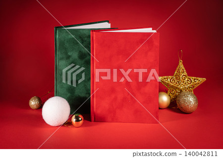 close up of a green and red tho velour fluffy notebooks on red christmas background with clipping path close up of a green and red tho velour fluffy notebooks on red christmas background with clipping path 140042811
