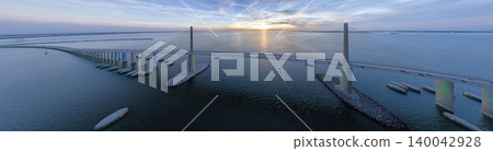 Sunrise aerial panorama of Sunshine Skyway Bridge over Tampa Bay Florida 140042928