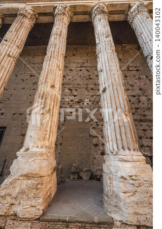 Ancient marble columns of the Temple of Antoninus and Faustina in Roman Forum Rome Italy 140043102