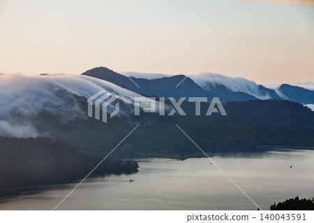 Sun Moon Lake mountains with rolling fog Sun Moon Lake mountains with rolling fog 140043591