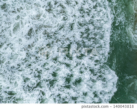 Sea surface aerial view,Bird eye view photo of blue waves and water surface texture Blue sea background Beautiful nature Amazing view sea background 140043818
