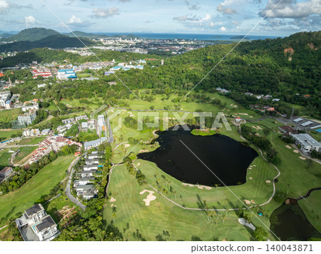 Aerial view drone shot of beautiful golf field in Phuket island Thailand Aerial view drone shot of beautiful golf field in Phuket island Thailand 140043871