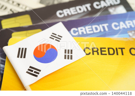 South Korea flag on credit card, finance economy trading shopping online business. South Korea flag on credit card, finance economy trading shopping online business. 140044118