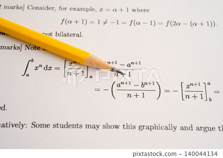 Pencil on mathematic formula exercise test paper in education school. Pencil on mathematic formula exercise test paper in education school. 140044134