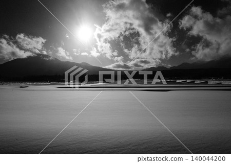 Light shining through the snow 140044200