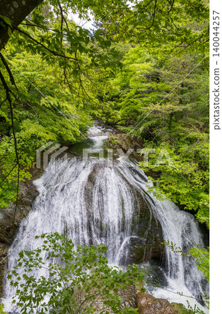 Sekiyama Great Waterfall cascading down a lush green valley: Clear streams and healing natural scenery of Yamagata Prefecture Sekiyama Great Waterfall cascading down a lush green valley: Clear streams and healing natural scenery of Yamagata Prefecture 140044257