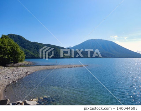 Mount Nantai as seen across Senju Beach and the lake. 140044695