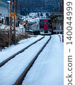 Nagano Electric Railway Snow Monkey train and Yudanaka Station platform 140044999