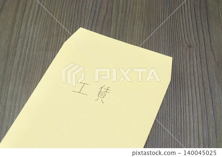A brown envelope labeled "Labor Wages" A brown envelope labeled "Labor Wages" 140045025