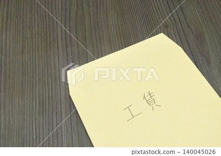 A brown envelope labeled "Labor Wages" A brown envelope labeled "Labor Wages" 140045026