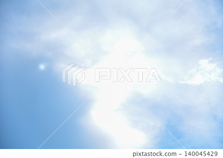 Cloudscape with clouds covering the sun under the blue sky. Nature scene, skyscape and cloudscape. Cloudscape with clouds covering the sun under the blue sky. Nature scene, skyscape and cloudscape. 140045429