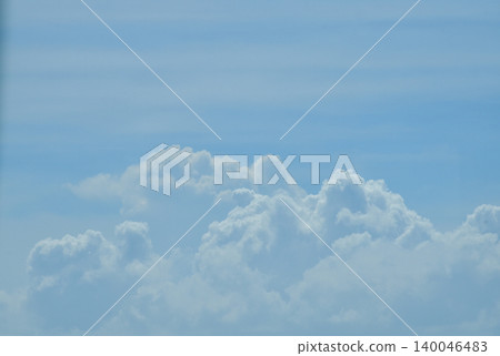 Big fluffy white clouds with the blue sky. Dramatic cloudscape. Nature scene. Nature background. Big fluffy white clouds with the blue sky. Dramatic cloudscape. Nature scene. Nature background. 140046483