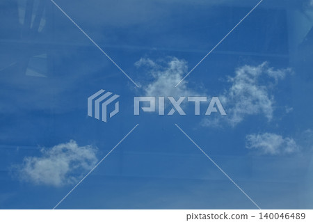 Big fluffy white clouds with the blue sky. Dramatic cloudscape. Nature scene. Nature background. Big fluffy white clouds with the blue sky. Dramatic cloudscape. Nature scene. Nature background. 140046489