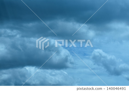 Big fluffy white clouds with the blue sky. Dramatic cloudscape. Nature scene. Nature background. Big fluffy white clouds with the blue sky. Dramatic cloudscape. Nature scene. Nature background. 140046491