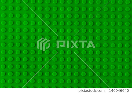 Green plastic building blocks baseplate texture, top view toy brick board pattern construction background Green plastic building blocks baseplate texture, top view toy brick board pattern construction background 140046640