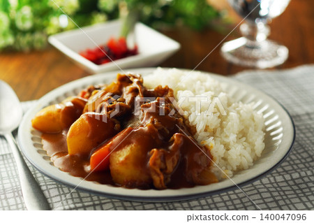 Beef curry with chunky vegetables Beef curry with chunky vegetables 140047096