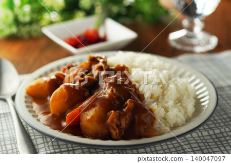 Beef curry with chunky vegetables Beef curry with chunky vegetables 140047097