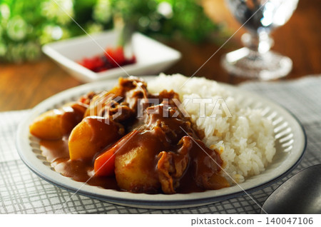 Beef curry with chunky vegetables 140047106
