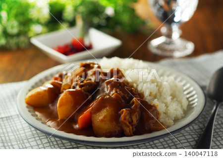 Beef curry with chunky vegetables Beef curry with chunky vegetables 140047118