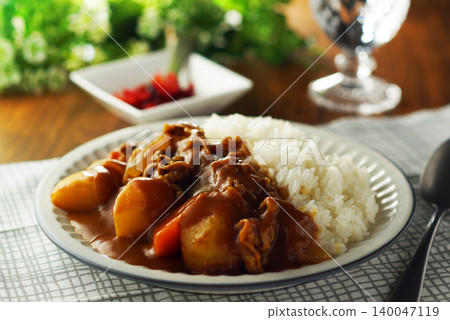 Beef curry with chunky vegetables Beef curry with chunky vegetables 140047119