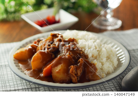 Beef curry with chunky vegetables Beef curry with chunky vegetables 140047149