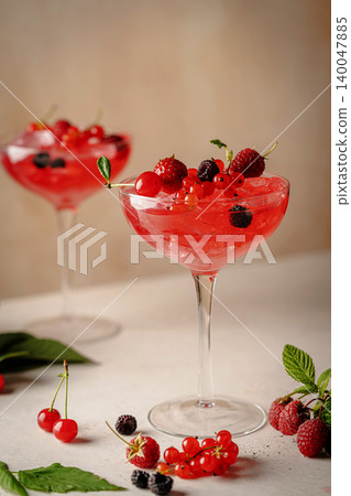 Glass of berry cocktail Glass of berry cocktail 140047885