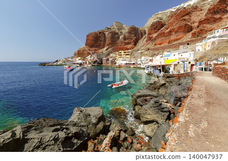 Ammoudi Bay waterfront with volcanic cliffs in Santorini Greece 140047937