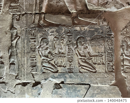 Beautiful bas-reliefs and ancient hieroglyphs in the Temple of Seti I in Abydos, Egypt. Beautiful bas-reliefs and ancient hieroglyphs in the Temple of Seti I in Abydos, Egypt. 140048475