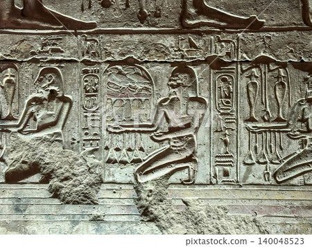 Beautiful bas-reliefs and ancient hieroglyphs in the Temple of Seti I in Abydos, Egypt. Beautiful bas-reliefs and ancient hieroglyphs in the Temple of Seti I in Abydos, Egypt. 140048523