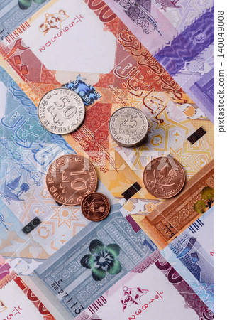 Qatar paper money, the Qatari riyal as a tool for financial transactions and trade. Qatari money 140049008