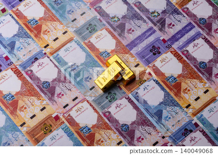 Qatari gold bars or ingots as a tool for balance, financial investment. Qatari gold bars 140049068