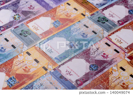 Qatar paper money, the Qatari riyal as a tool for financial transactions and trade. Qatari money Qatar paper money, the Qatari riyal as a tool for financial transactions and trade. Qatari money 140049074