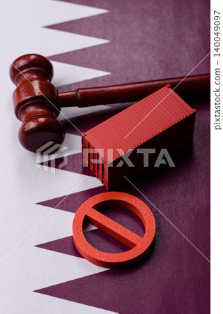 The cargo container ban on the Qatar flag as a conceptual backdrop. The cargo container embargo 140049097